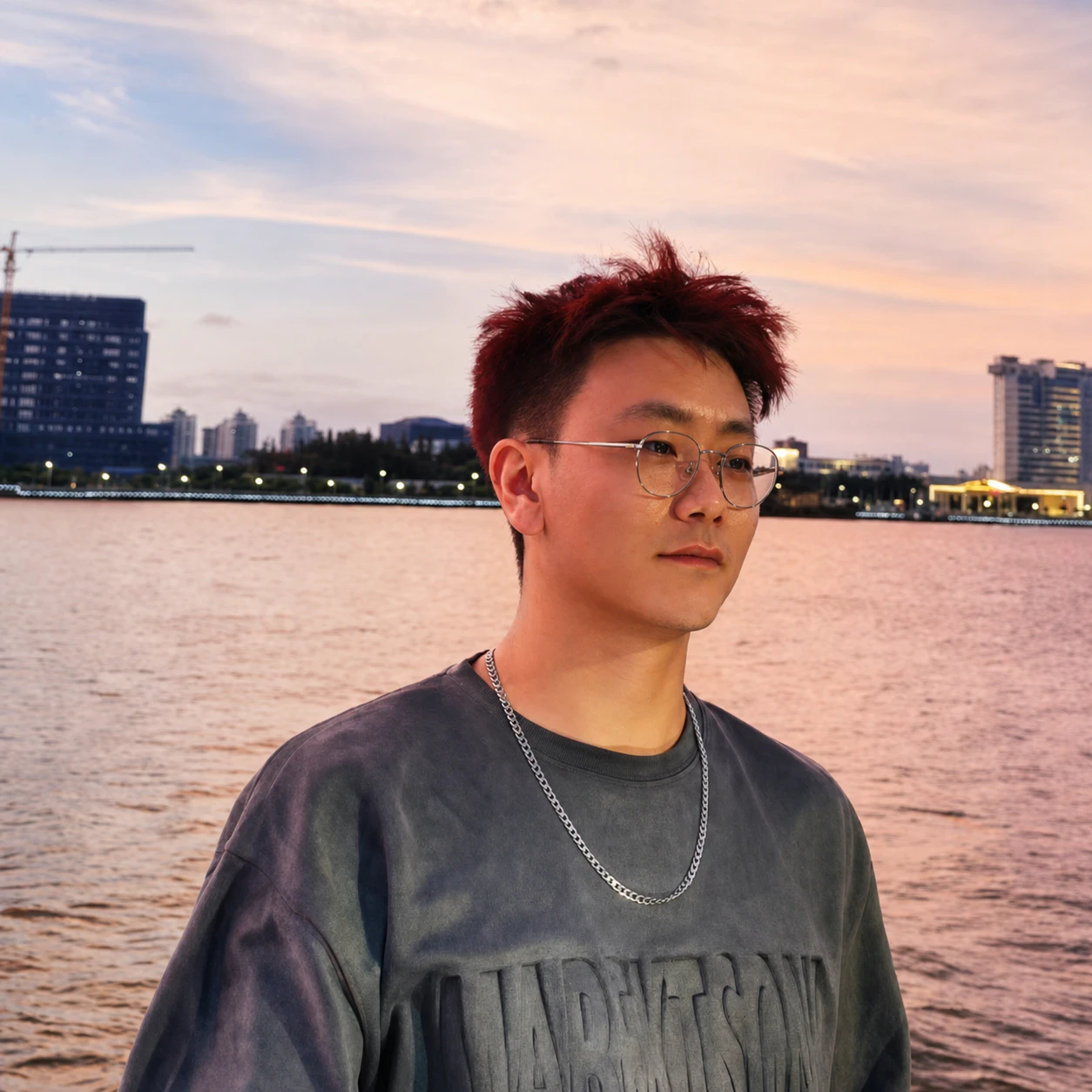 Portrait of Lihong Wang by the lake at sunset
